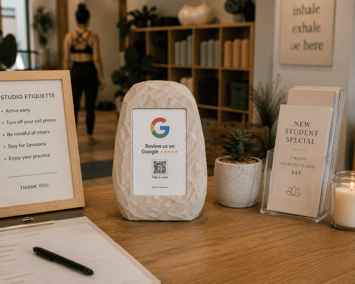 Review Totem at a yoga studio front desk